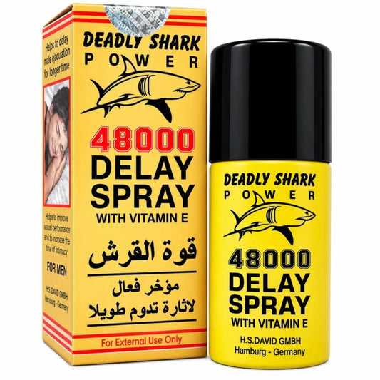Deadly Shark Power 48000 delay spray 45ml with vitamin E, yellow bottle beside yellow box with shark.